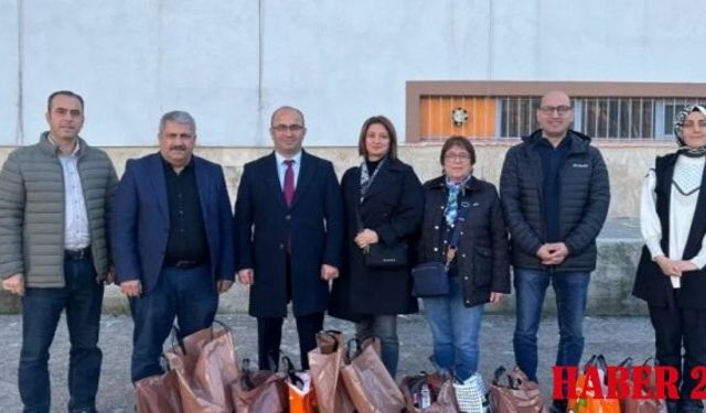 Trabzon Gümüşhaneliler Derneği'nden Torul'daki Okullara Anlamlı Destek: Kışlık Kıyafet ve Kitap Dağıtıldı